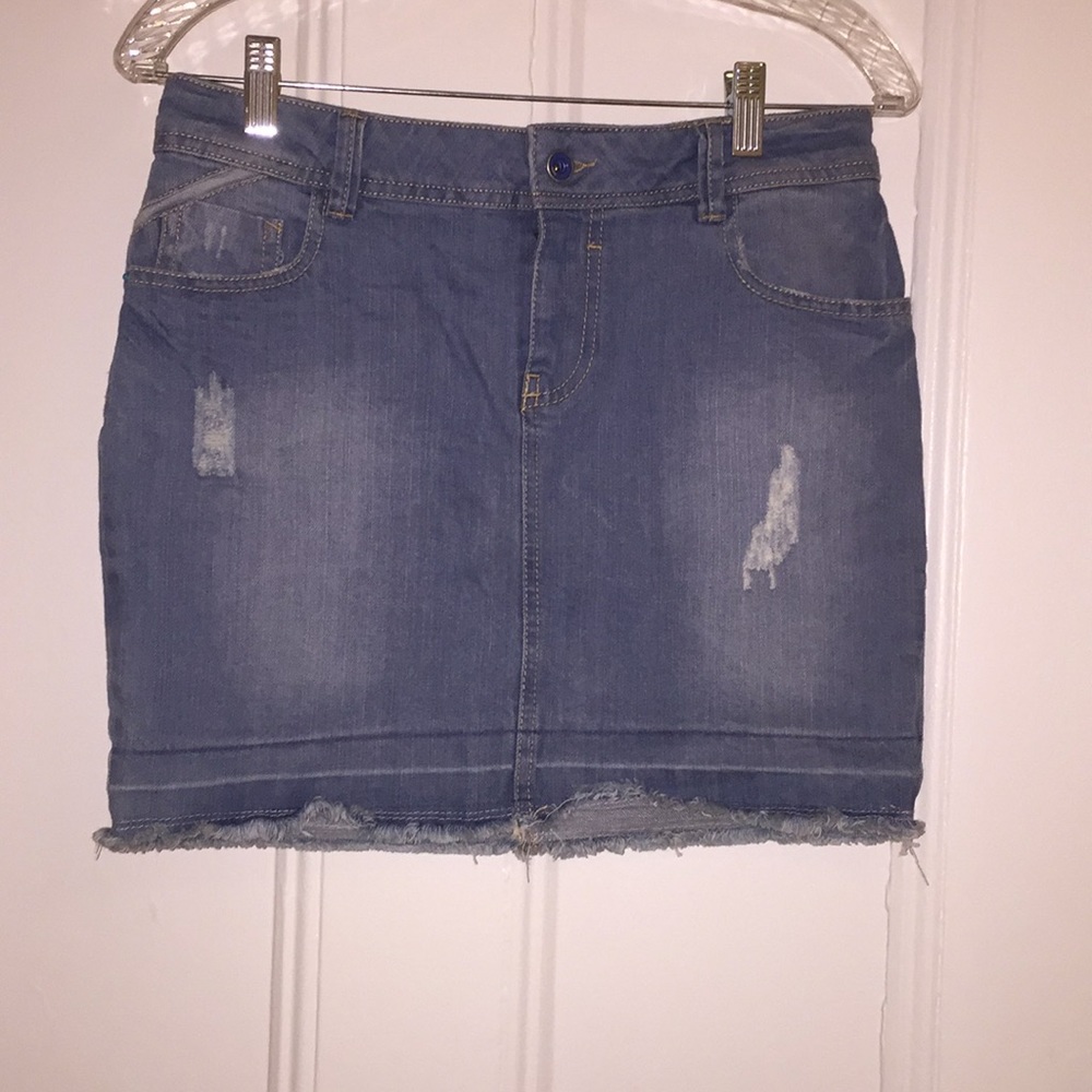 Distressed light denim mini skirt